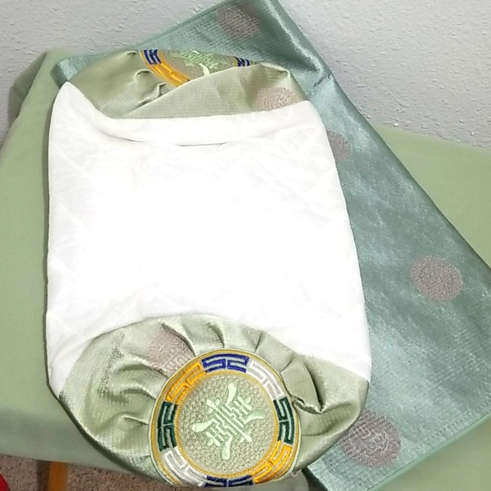 Oriental round pillow case and covers.
